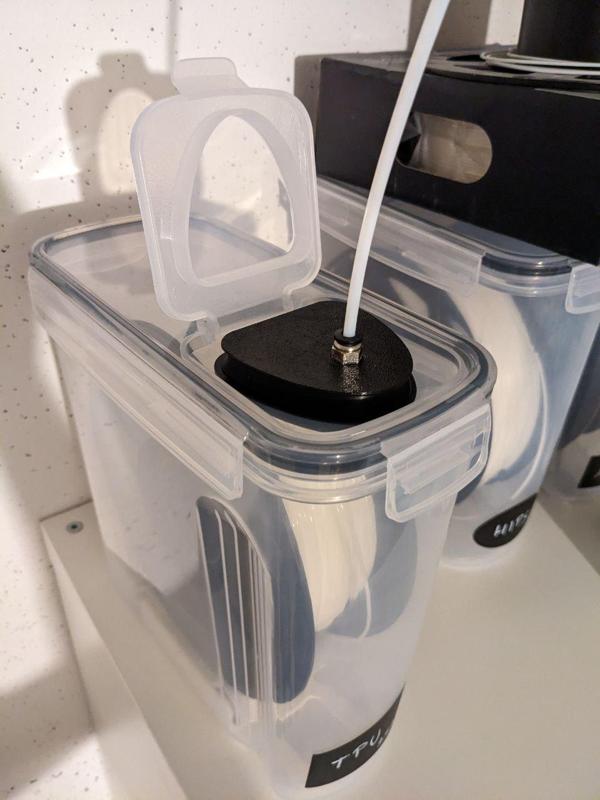 Cereal container filament drybox PTFE cap