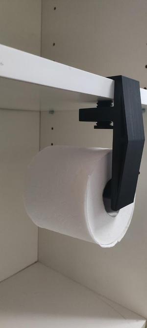 Under desk toilet paper holder 