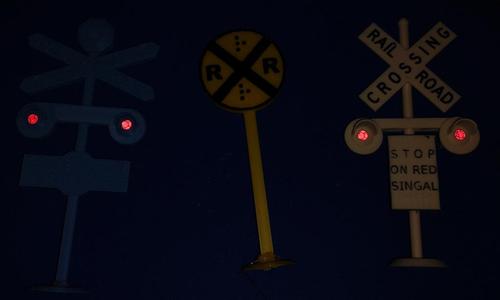 RAILROAD CROSSING SIGNS WITH BRAILLE
