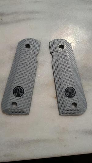 1911 Operator style grips W/ frontstrap grip and 14.25mm OPA medallions. 