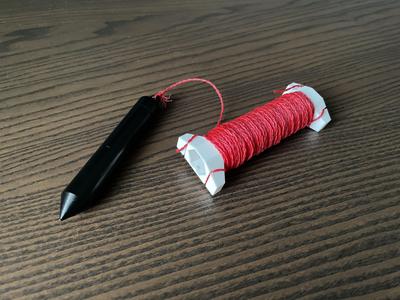 Plumb bob spool
