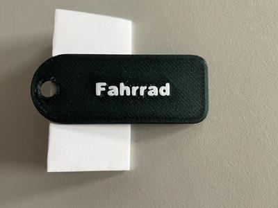 Keychain or name tag