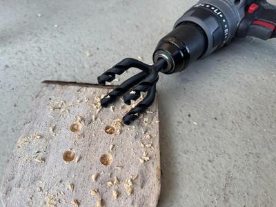 Quad drill bit