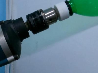 Bottle holder for electric drill