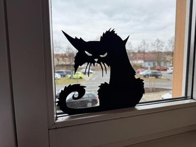 Naughty Cat as Window Decoration