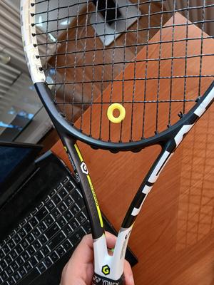 Super light ring tennis racket vibration dampener