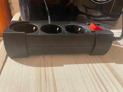 Halterung für Steckdosenleiste, Power strip