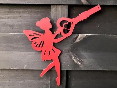 Flying fairy with an enchanted key