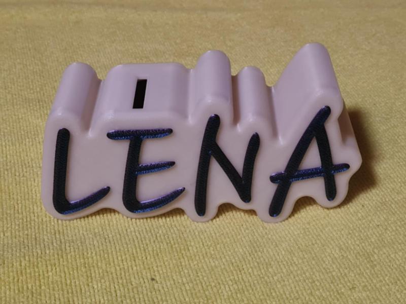 Piggy bank with the inscription Lena