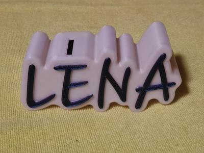 Piggy bank with the inscription Lena