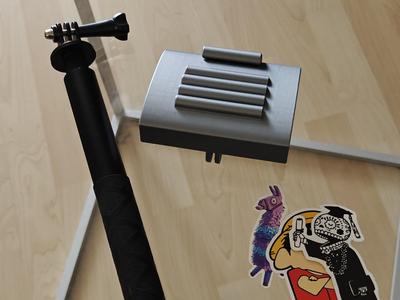 Sticker applicator for selfie stick (GoPro mount)