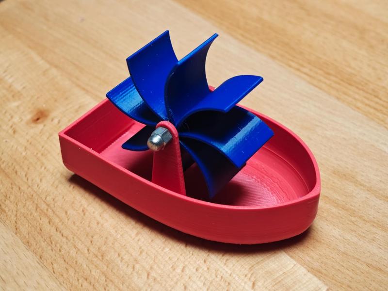 Bathtub toy boat with water wheel
