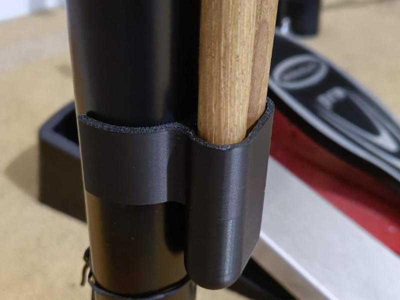 Drumstick holder for standard drum rack