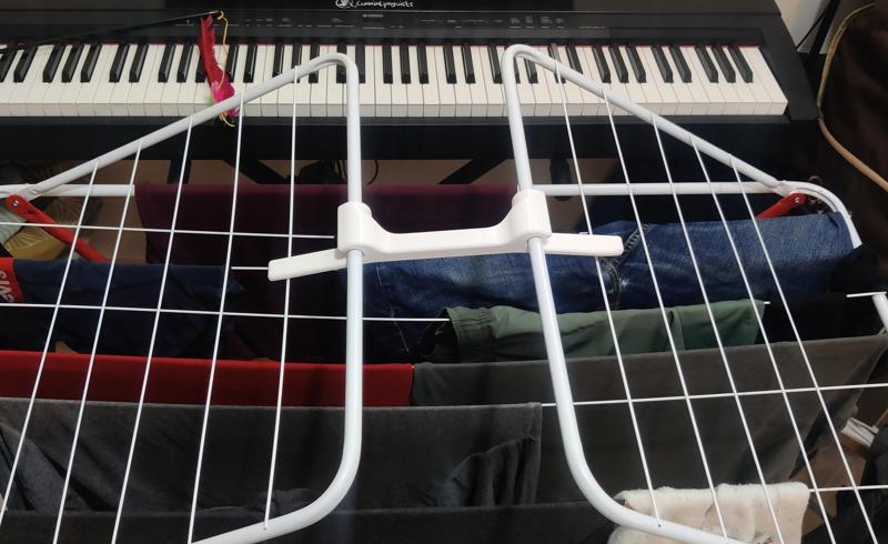 Clothes drying rack spacer