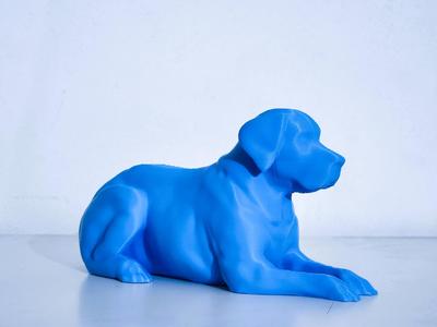 Relaxed Labrador statue