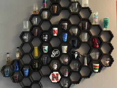 Wall mounted hexagon shelves / Shot glass display