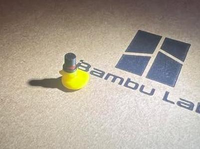 Tiny duck wearing a top hat