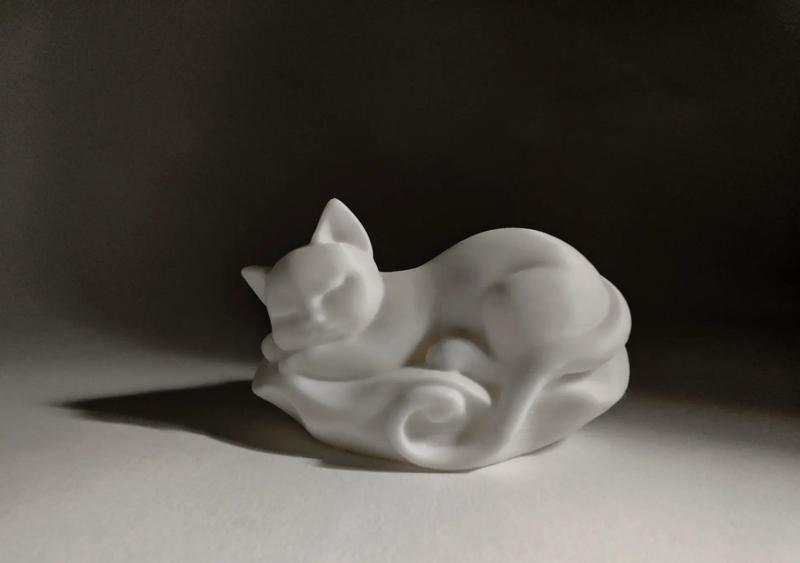A sleeping kitten, an animal model art piece