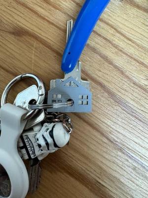 Door key cap in the shape of house