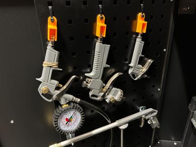 Compressor accessory holder