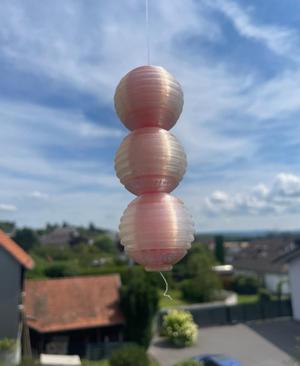 Orbiting Balls on a String (Astrojax)