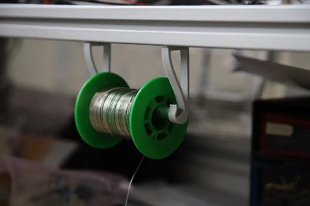 V-slot solder spool holder   