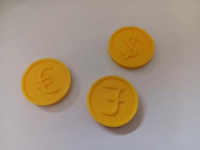Coins with currency symbols - € / $ / £   