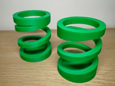 Spring pen holder