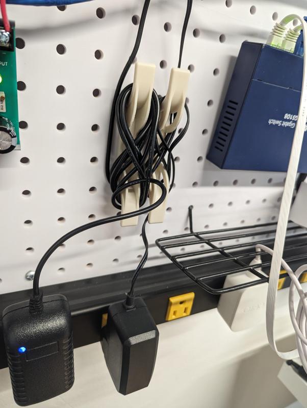 Pegboard cable management (spool, holder)