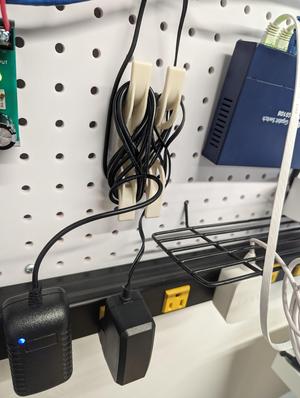 Pegboard cable management (spool, holder)