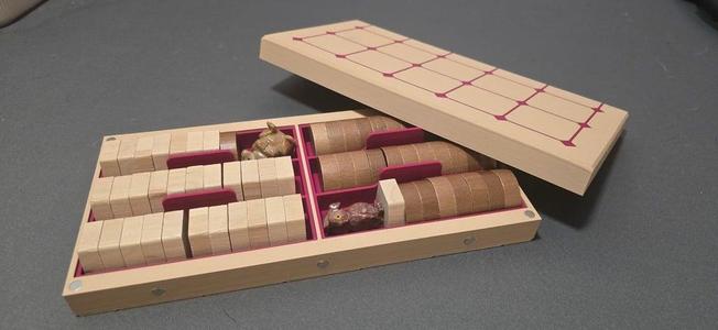 The Journeyman: a Travel Tak Board with Piece Trays