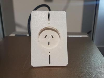 Extension cord wall plate