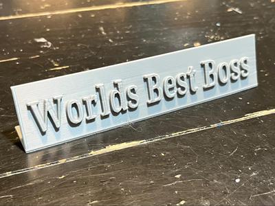 "Worlds Best Boss" sign