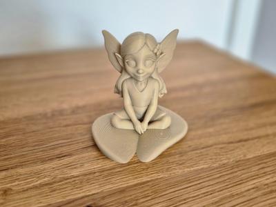 Seated Fairy Figurine – Decorative 3D Figure