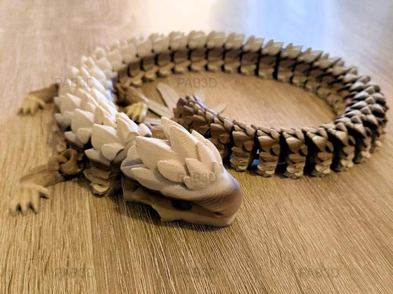 Articulated flexi dragon feathers