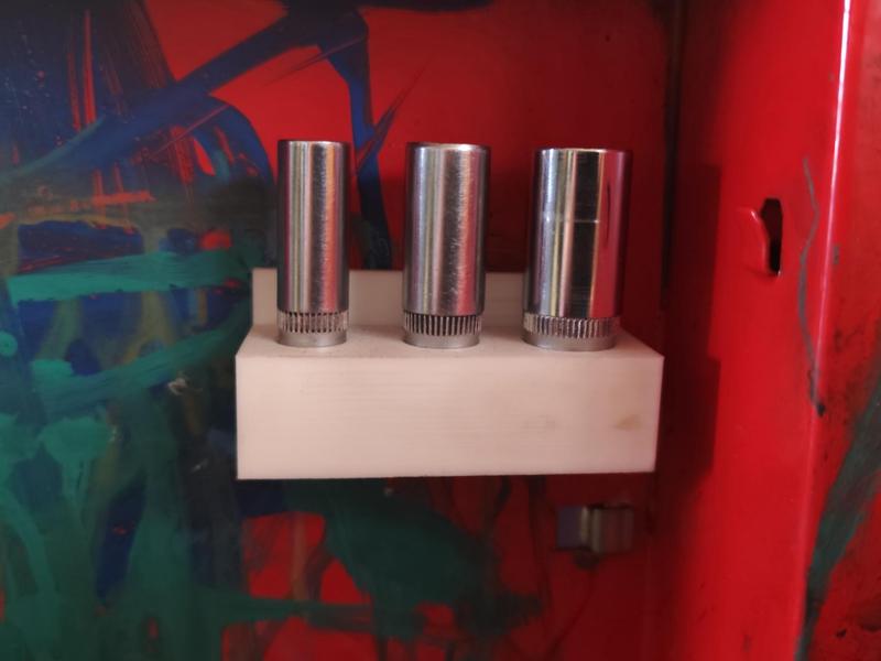 Socket wrench holder for sizes 8, 10, and 13
