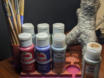 craft paint display organizer with brush holder.