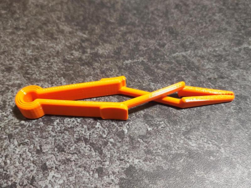 Cross Tweezer