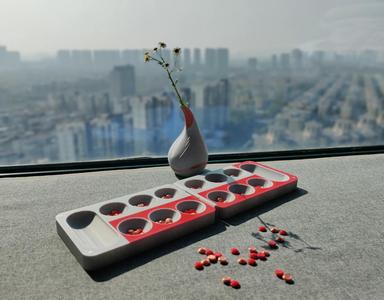 Mancala (also known as African Chess or Sowing Chess)