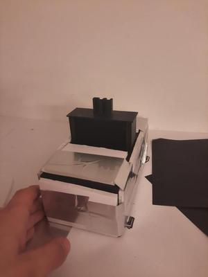 super simple filter box for 80mm fan and carbon filter pad.