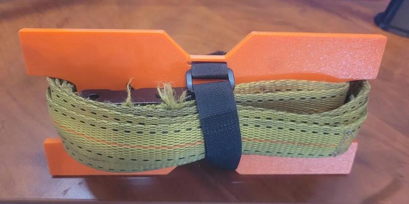 Tie down strap holder   