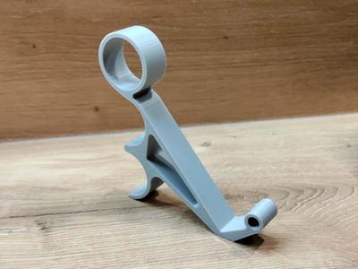 Any hand pinky saver & phone stand