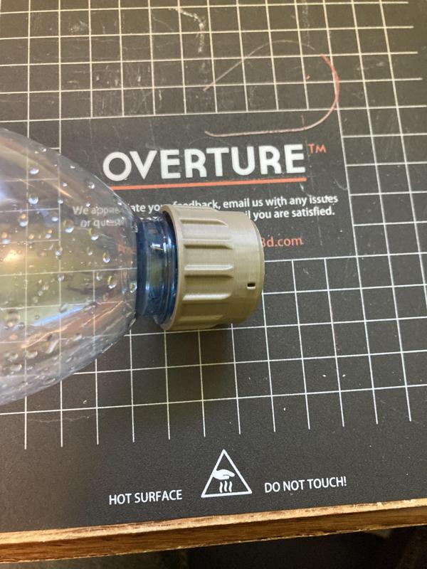 Bum Buddy with disposable water bottle threads