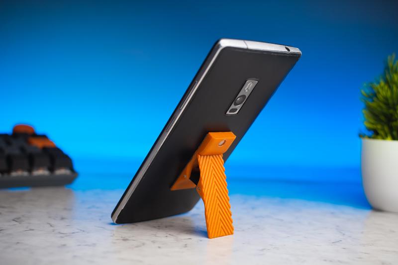 Phone holder or kickstand