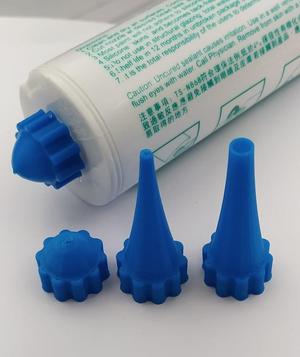 Seal gun nozzles and cork