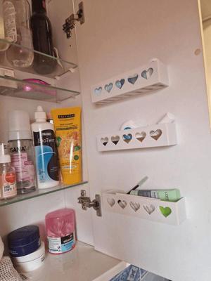 Shelf on the back door of the bathroom cabinet
