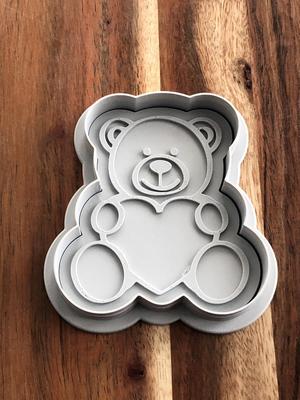 Teddy Bear holding Heart Cookie Cutters and Stamps