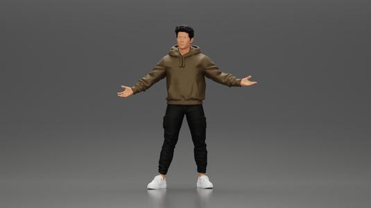 Asian Man Standing in Hoodie with Raised Hands