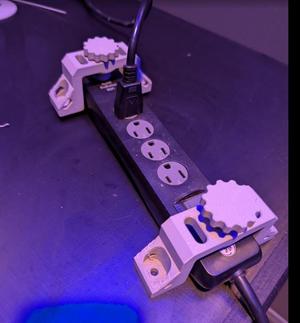 Powerstrip Mounting Brackets (US typical outlet type)