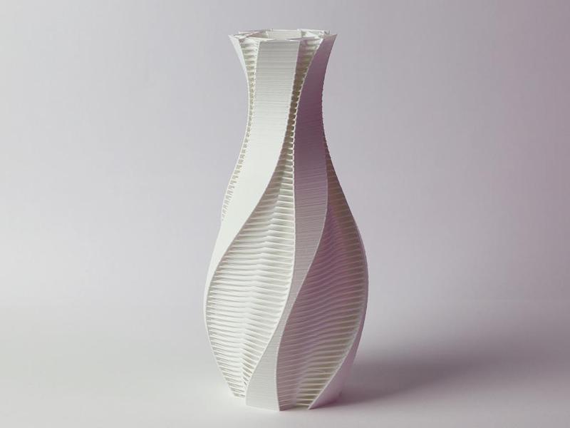 Twisted vase with strands